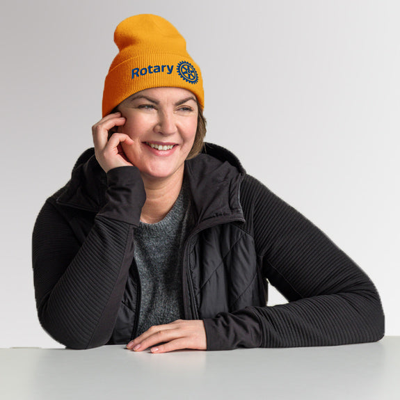 Woman-wearing-Master-brand-gold-color-embroidered-beanie-rotary-international-high-quality-awards-california