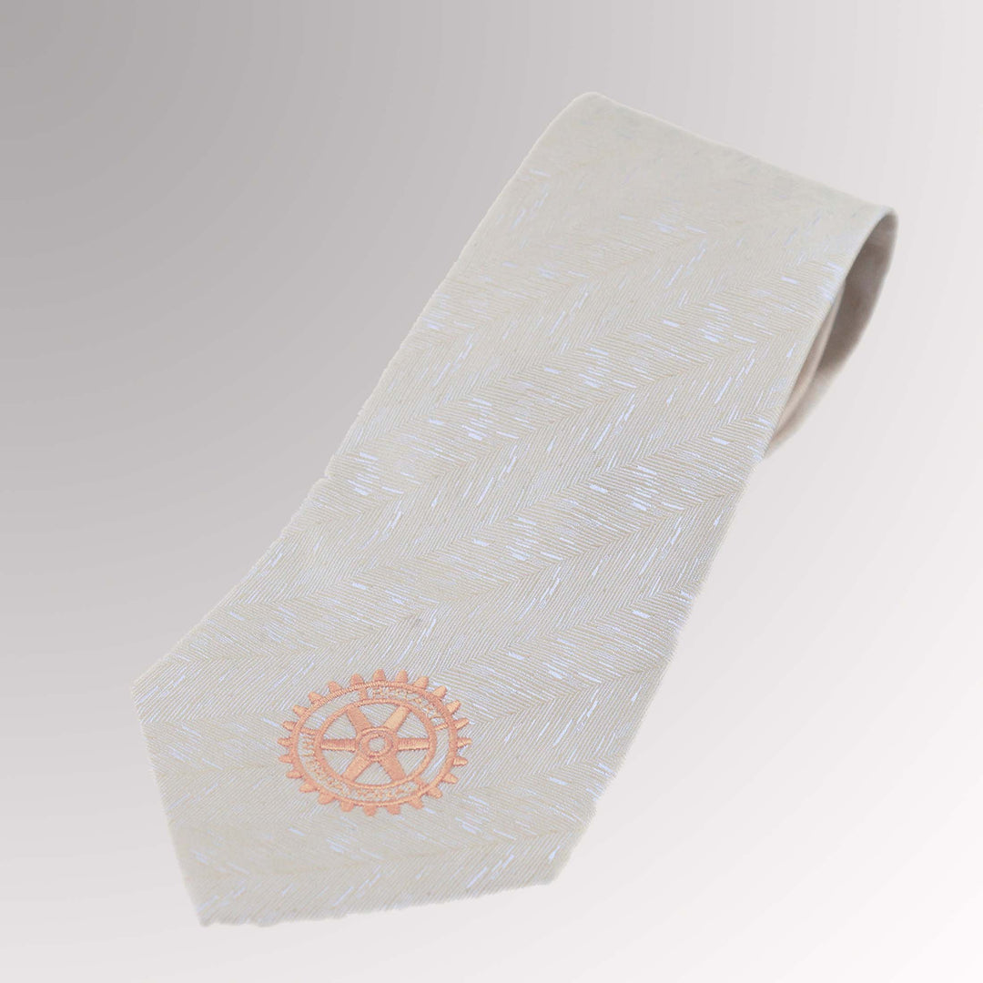 A microfiber tie featuring an embroidered Rotary logo.
