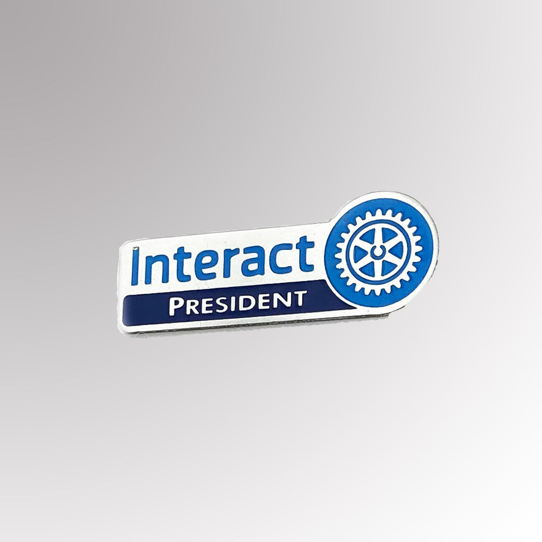 A stainless steel Interact President Pin featuring the New Interact logo with a silver finish.