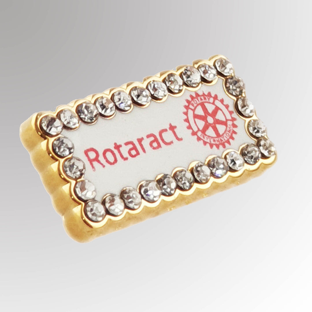 A high-quality Fancy Interact Member Pin featuring the New Rotaract Club logo with a polished finish.