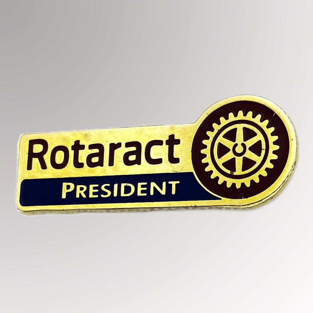 A gold-plated Rotaract President Pin made from brass featuring the new Rotaract logo.