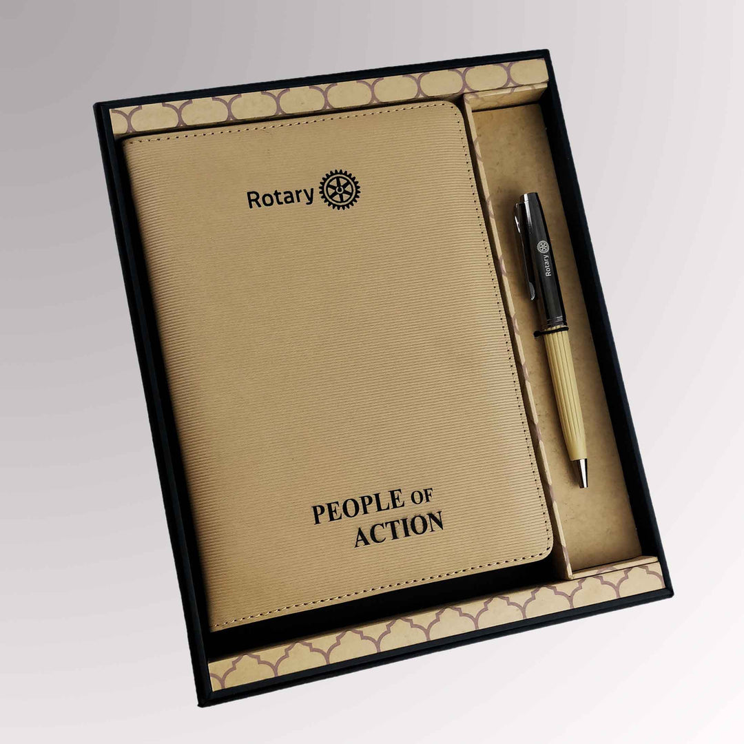 A Rotary Gift Set featuring an A5 notebook with Rotary International's Master Brand logo.