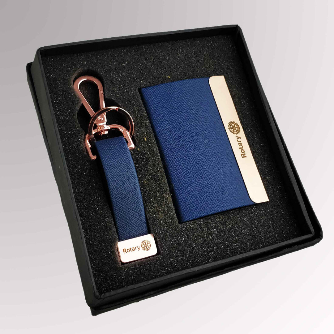 A Rotary Gift Set featuring a key chain and card holder with Rotary International's Master Brand logo.