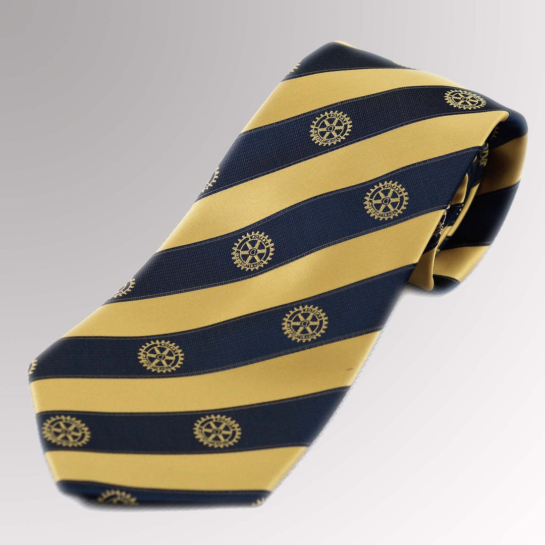 A woven silk tie featuring yellowish gold and blue stripes with Rotary International's Gold Mark of Excellence.