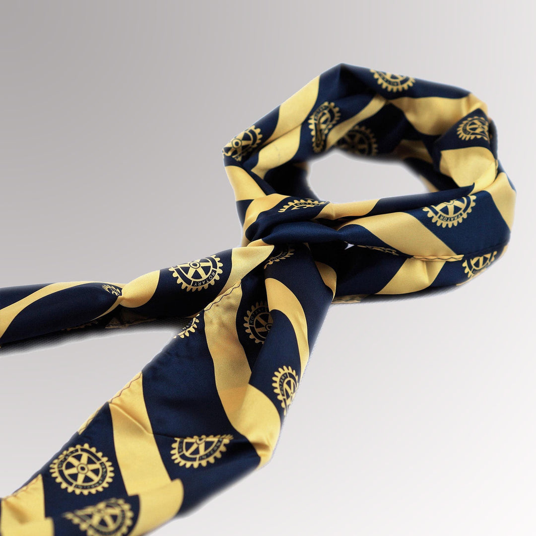 A high-quality silk scarf featuring Rotary International's Mark of Excellence.