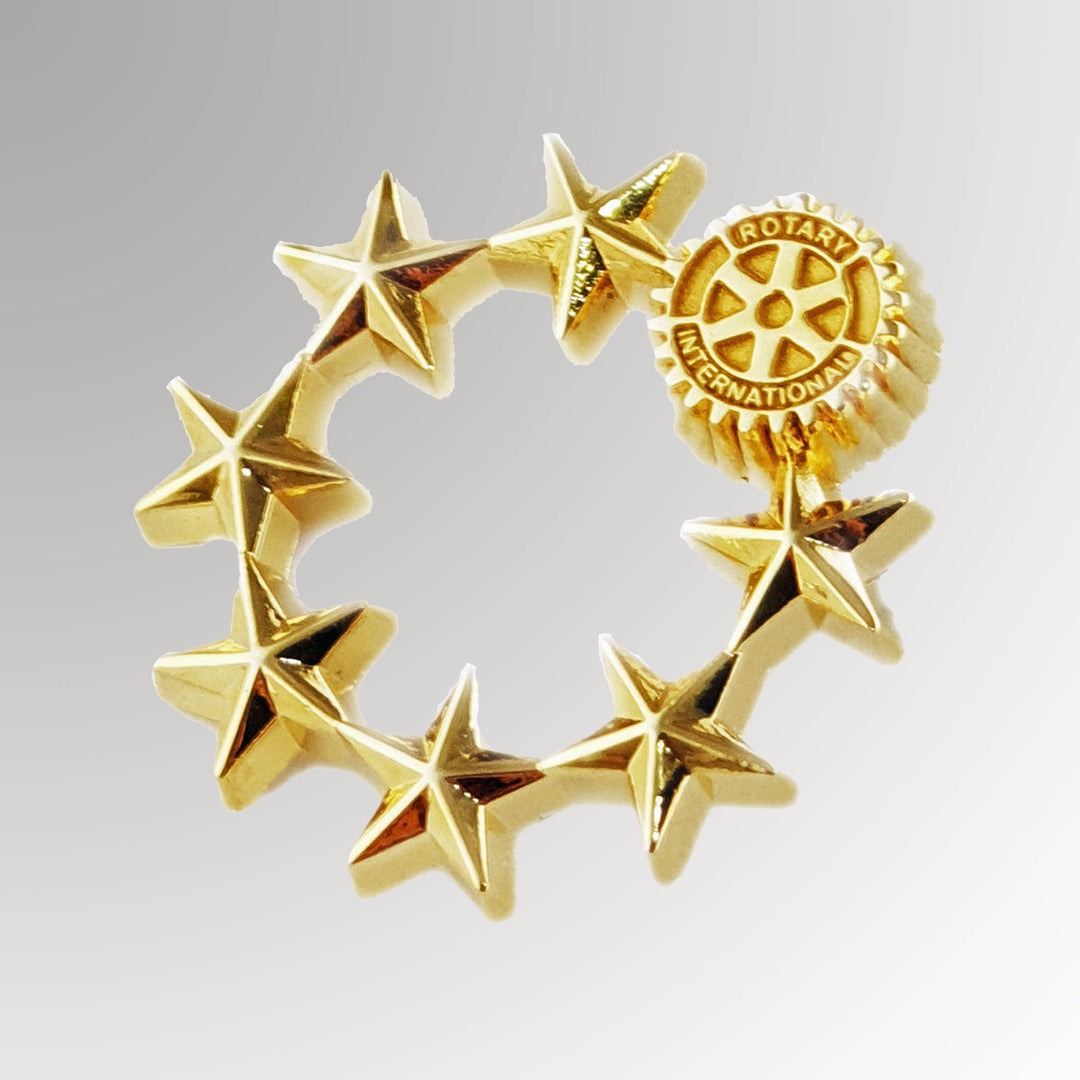 A gold-plated Rotarian Super Star Pin made from zinc alloy featuring the Rotary Mark of Excellence.