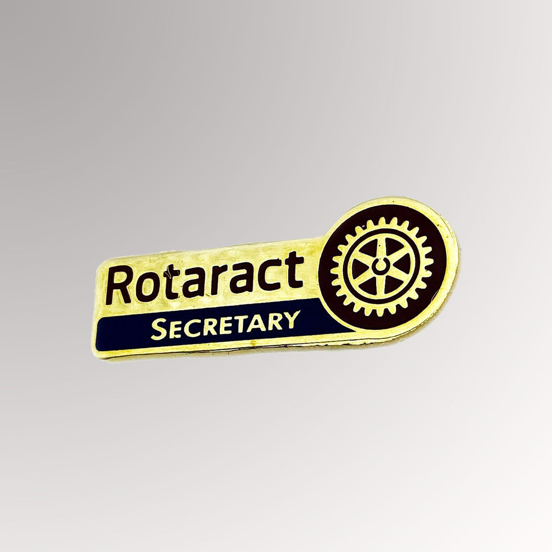 A gold-plated Rotaract Secretary Pin made from brass featuring the new Rotaract logo.